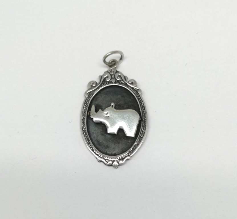 Sterling-Silver-Rhino-Pendant-in-Vintage-Frame-Goldfish-Jewellery-Design-Studio
